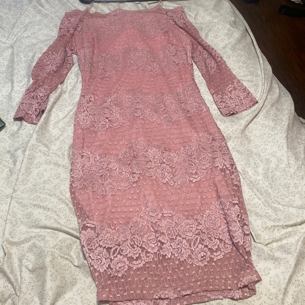 Rose pink color. Never worn before. Lace design.